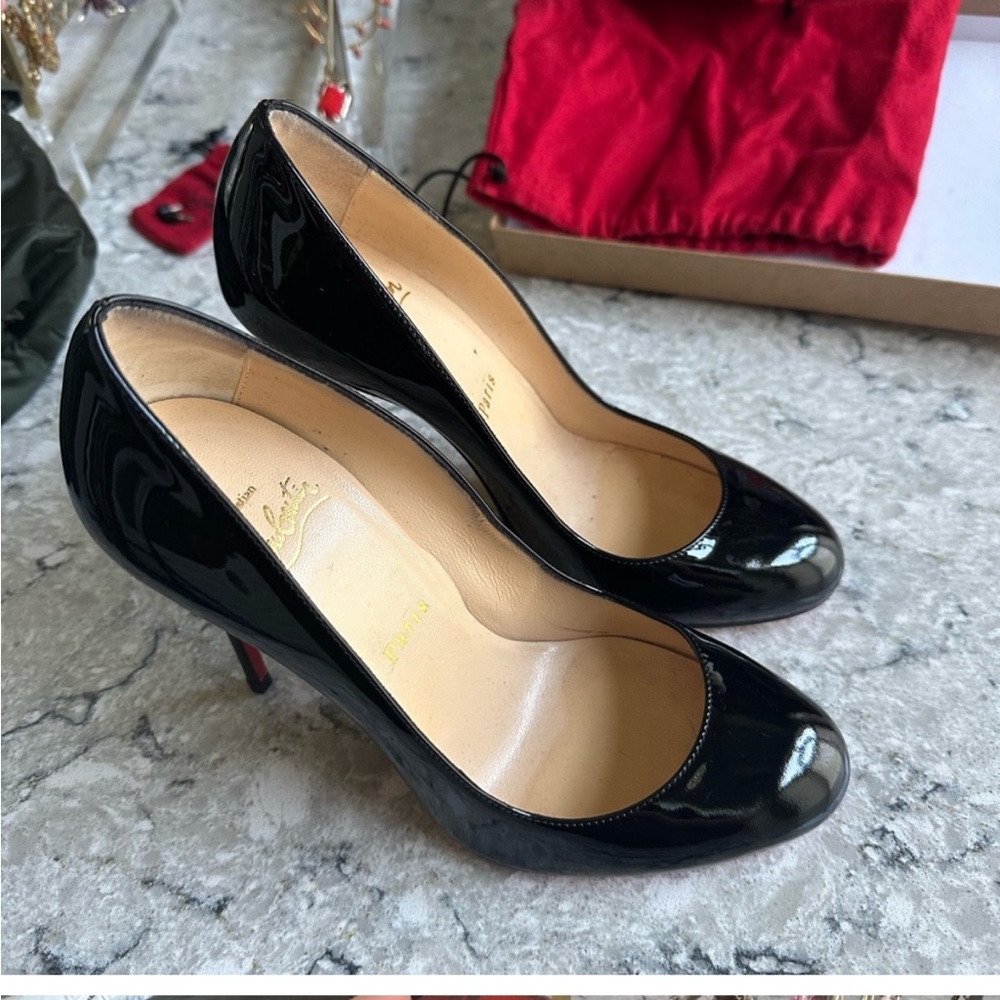 Christian Louboutin Round Toe Pumps